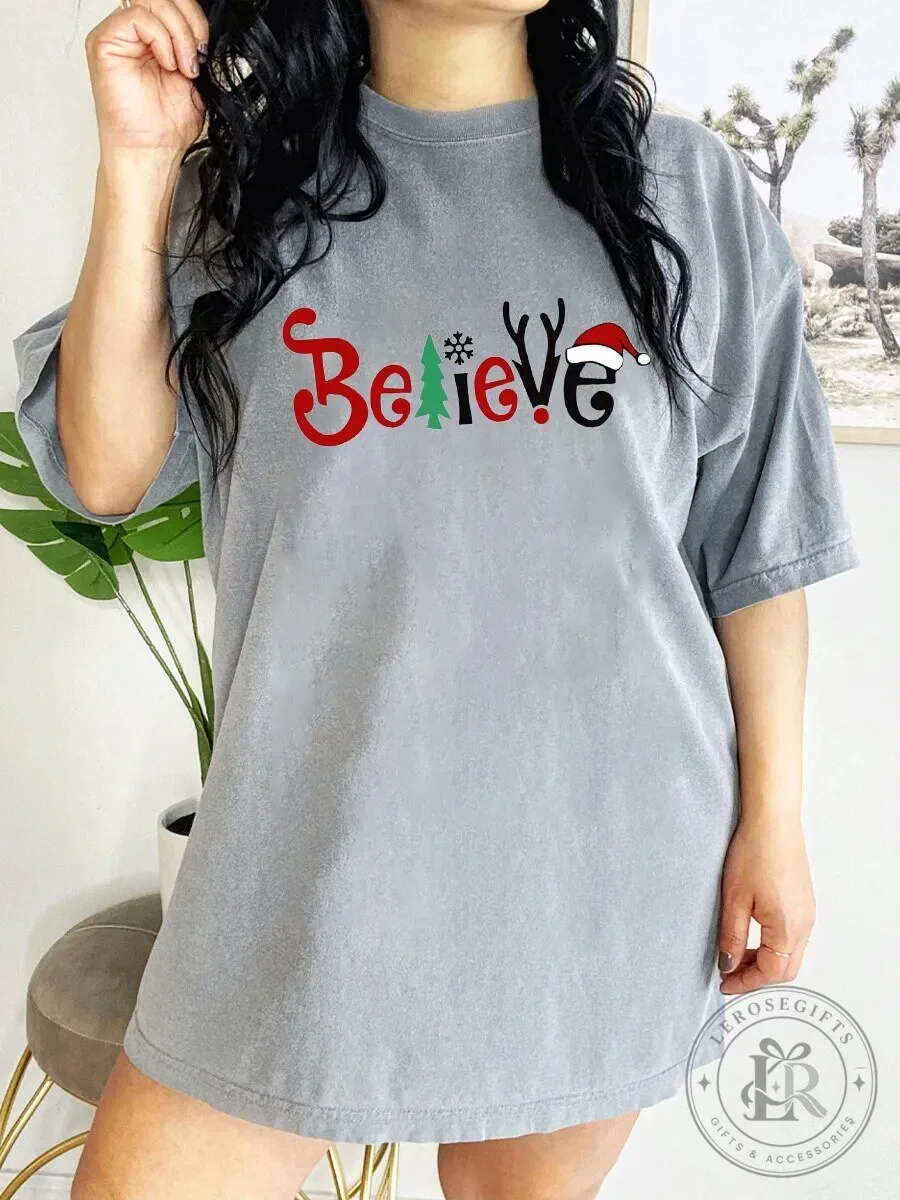 Believe Christmas Tree Reindeer Antlers Santa Hat Holiday T-Shirt